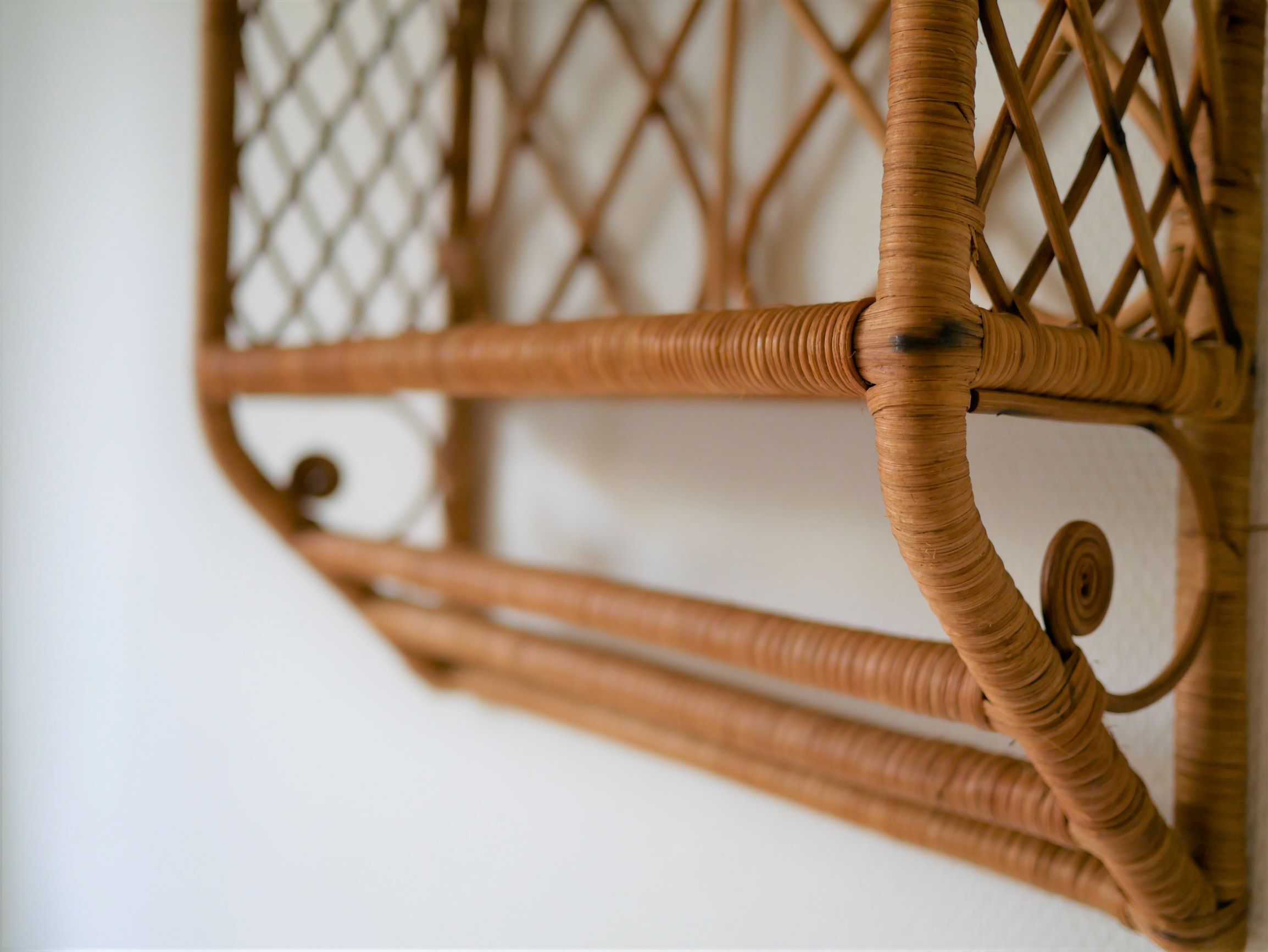 Rattan wall shelf
