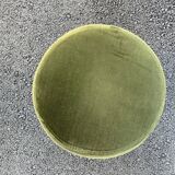 Green velvet pouf