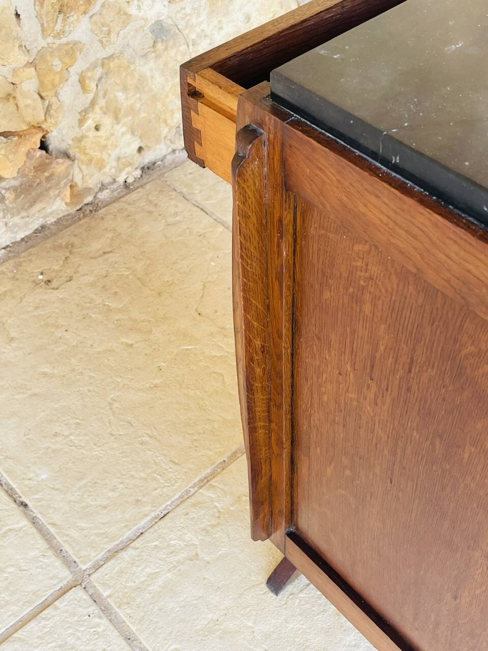 Art Deco bedside table in walnut, black marble top, circa 1920.