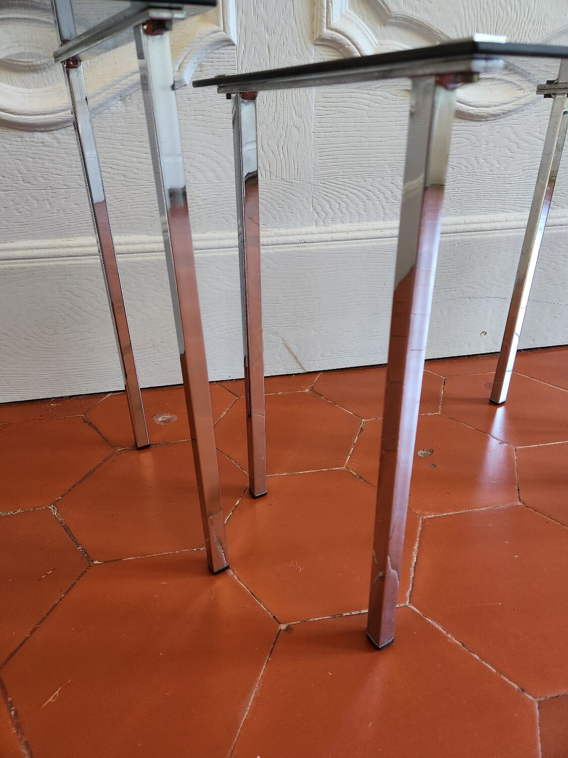 3 nesting tables from the 1970s in smoked glass.