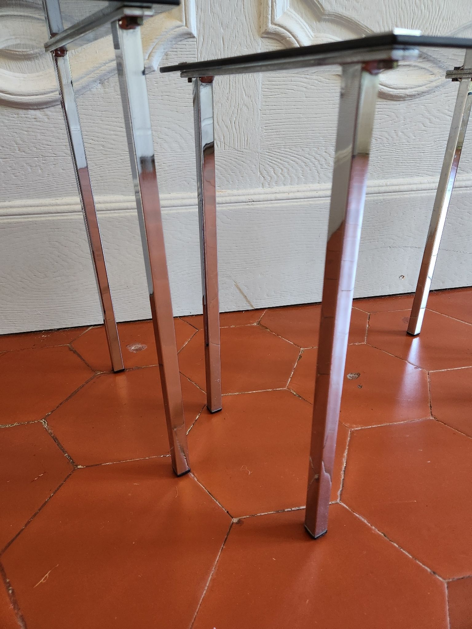 3 nesting tables from the 1970s in smoked glass.