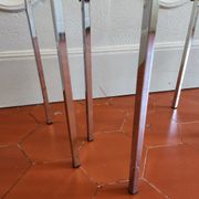 3 nesting tables from the 1970s in smoked glass.