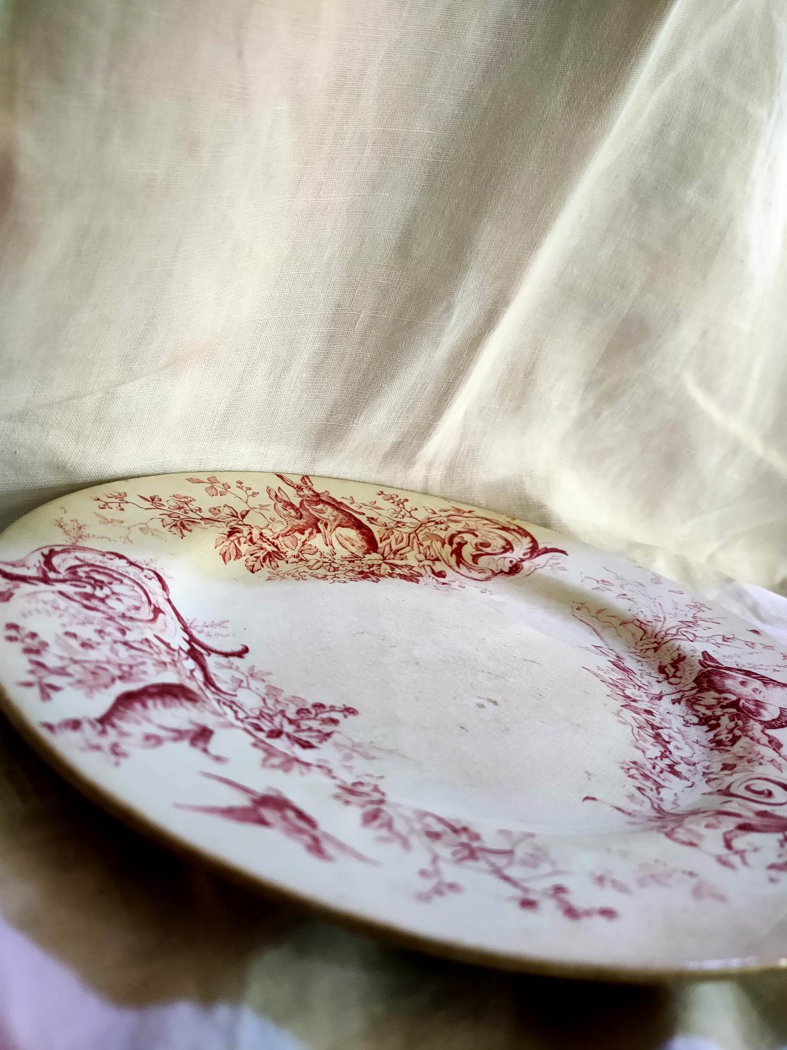 Assiette plate terre de fer faïence de Lunéville K/G