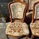 8 cherry wood chairs in Louis XV style with velvet upholstery.
