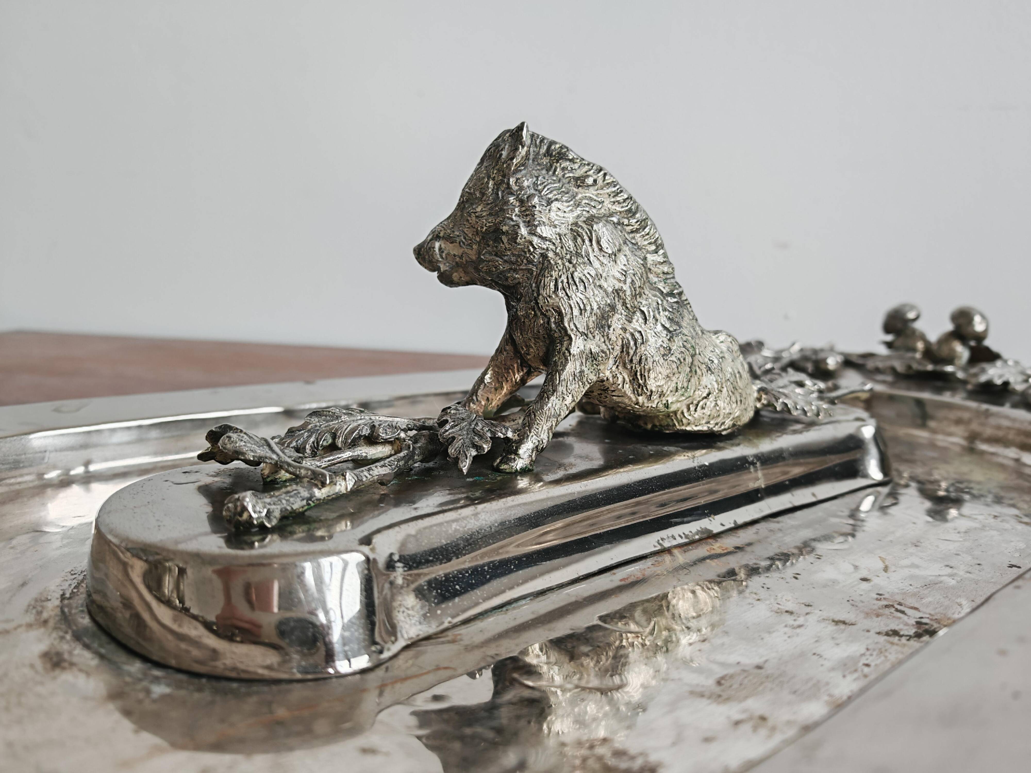 Silver serving dish by Franco Lapini with boar sculpture.