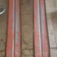 Old skis wooden and its pair of sticks