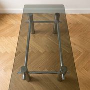 Vintage 1970s coffee table in smoked glass and chrome metal.
