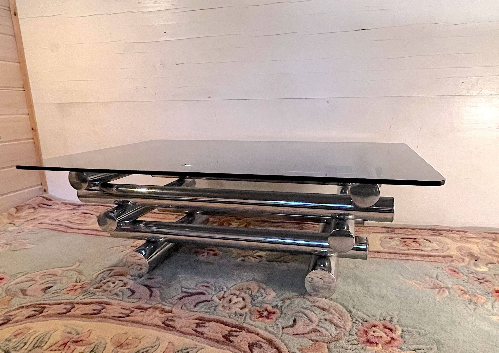 Chromed metal and smoked glass coffee table, dlg Willy Rizzo, mid-20th century