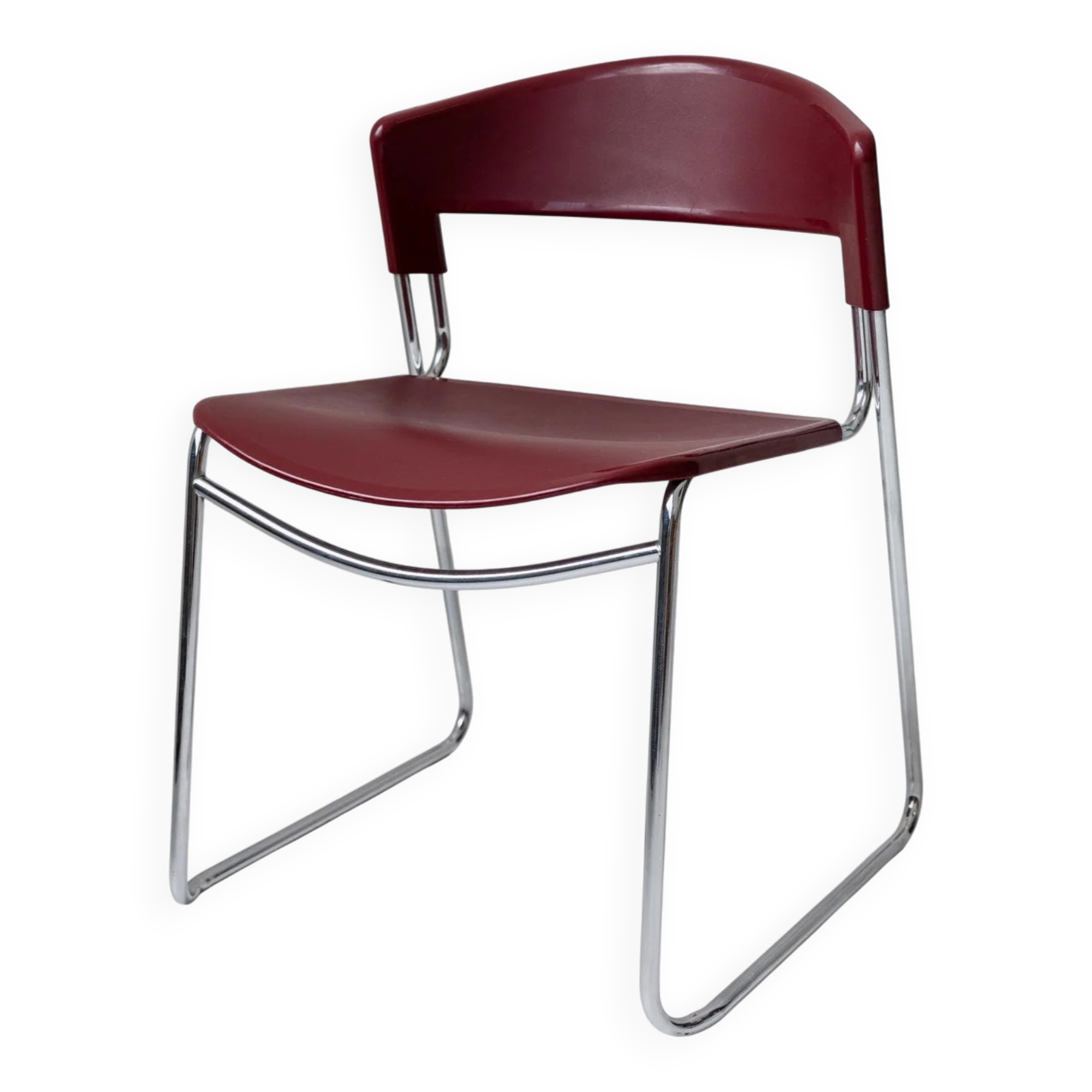 Vintage dining chair from the 1980s by Paolo Favaretto for Assisa, stackable, design Italy 1986 - chrome and red plastic - a classic of design.