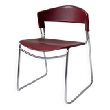 Vintage dining chair from the 1980s by Paolo Favaretto for Assisa, stackable, design Italy 1986 - chrome and red plastic - a classic of design.