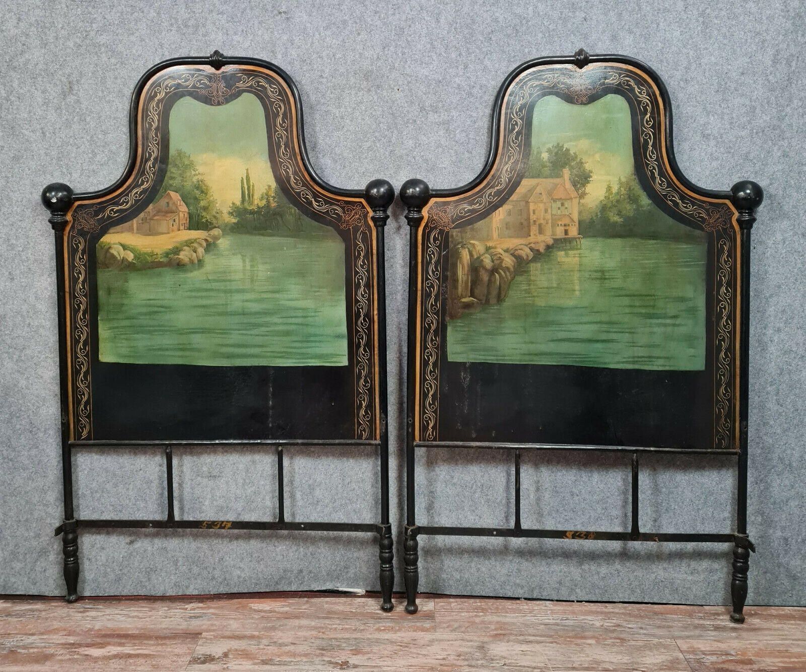 Pair of cast iron beds with hand-painted decorations period