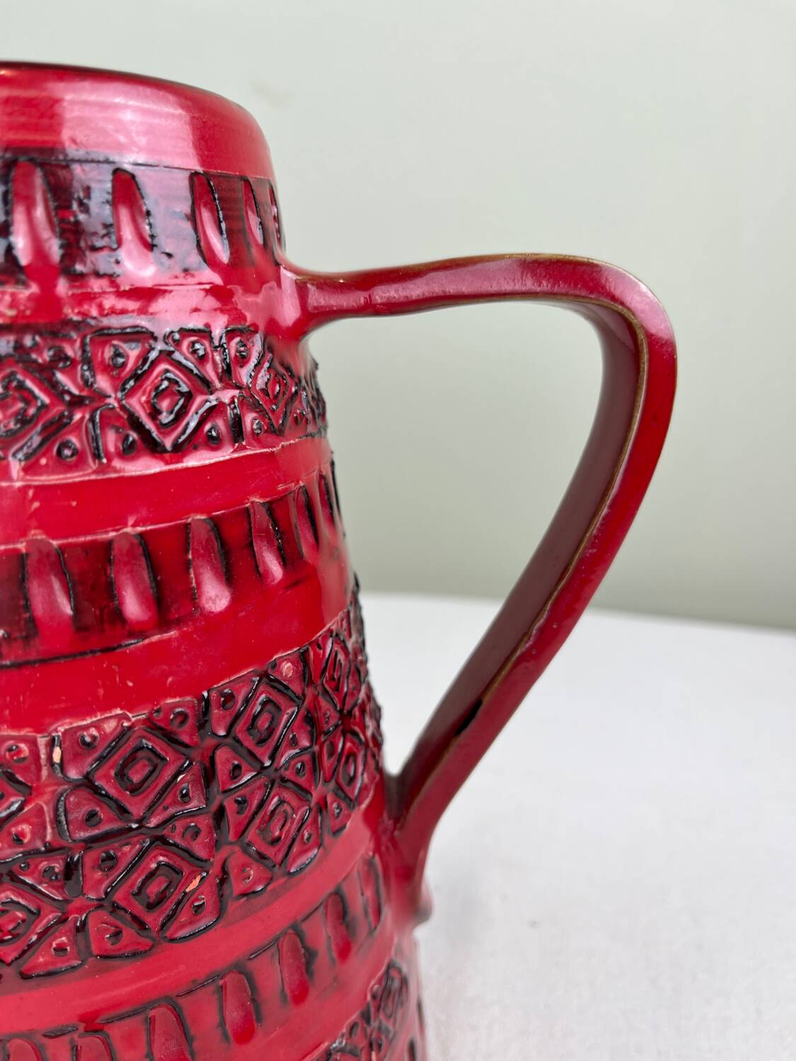 Vintage red ceramic jug