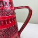 Vintage red ceramic jug