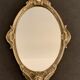 Bronze hand-facing mirror, early twentieth century, Louis XV style, 29 x 13 cm