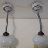 Duo of swan collar wall lamps