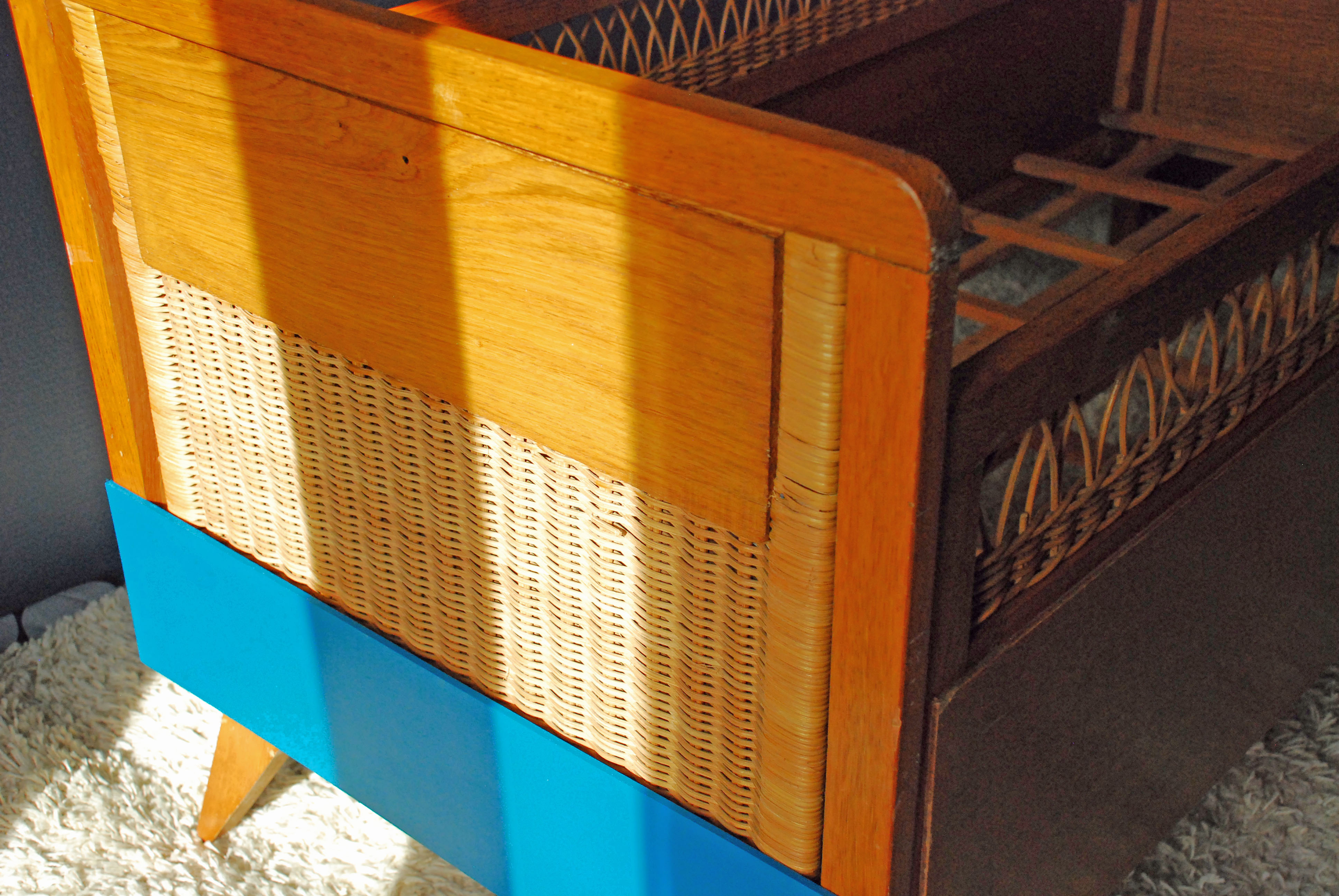 Wooden bed and vintage rattan