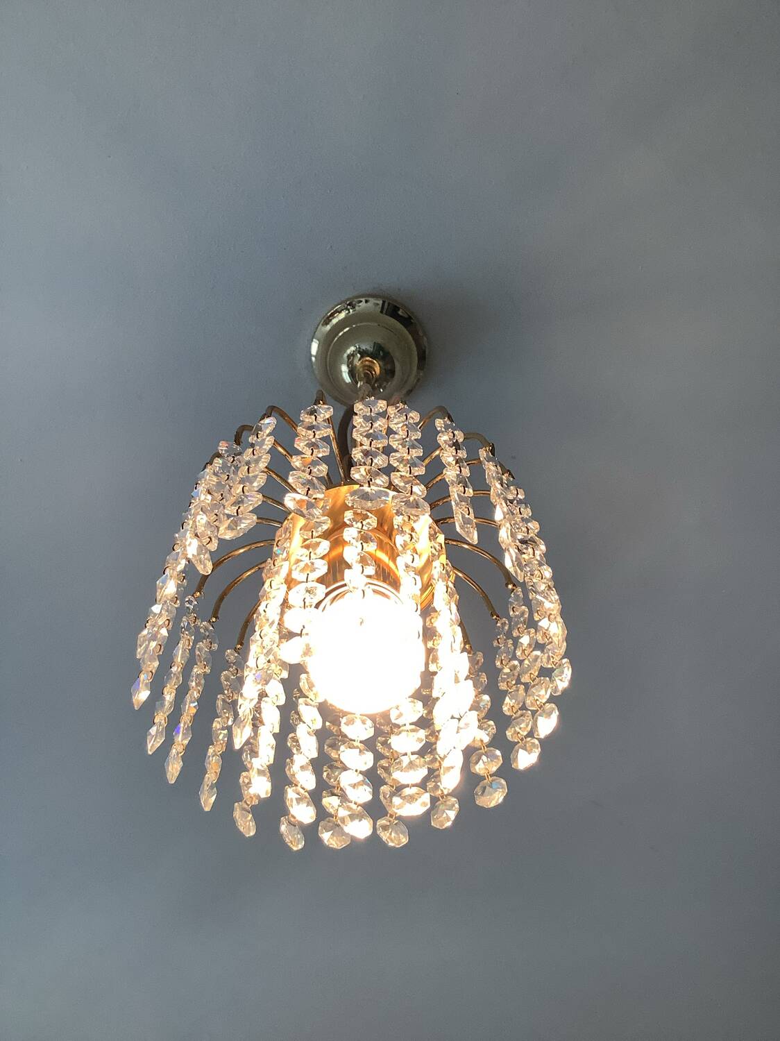 Small vintage brass chandelier with crystal droplets