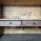 Antique rustic wardrobe in raw wood