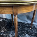 A Louis XVI period mahogany half-moon table forming a console/games table