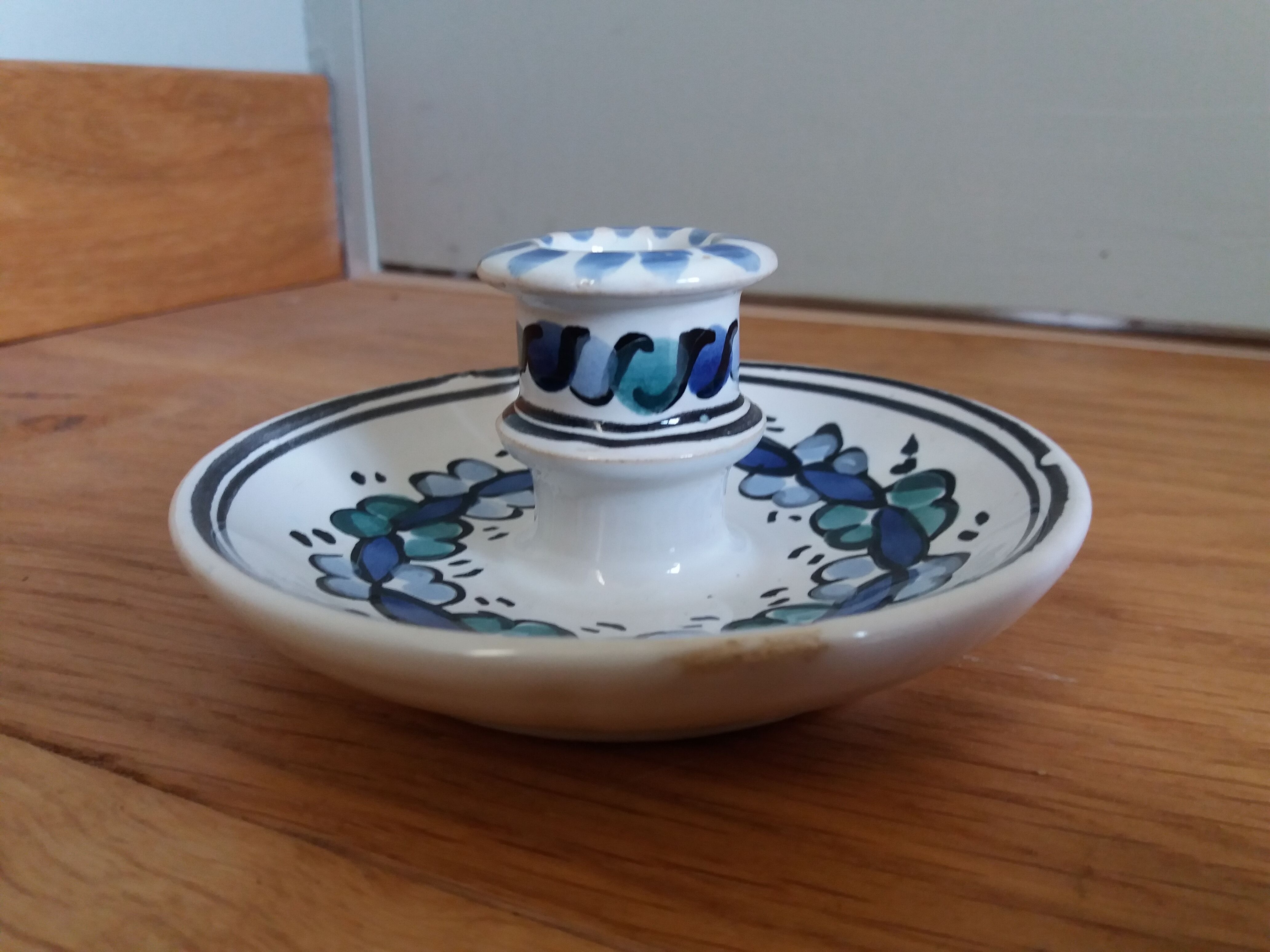 Cellar rat candle holder