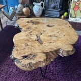Tripod coffee table in natural solid elm magnifying glass