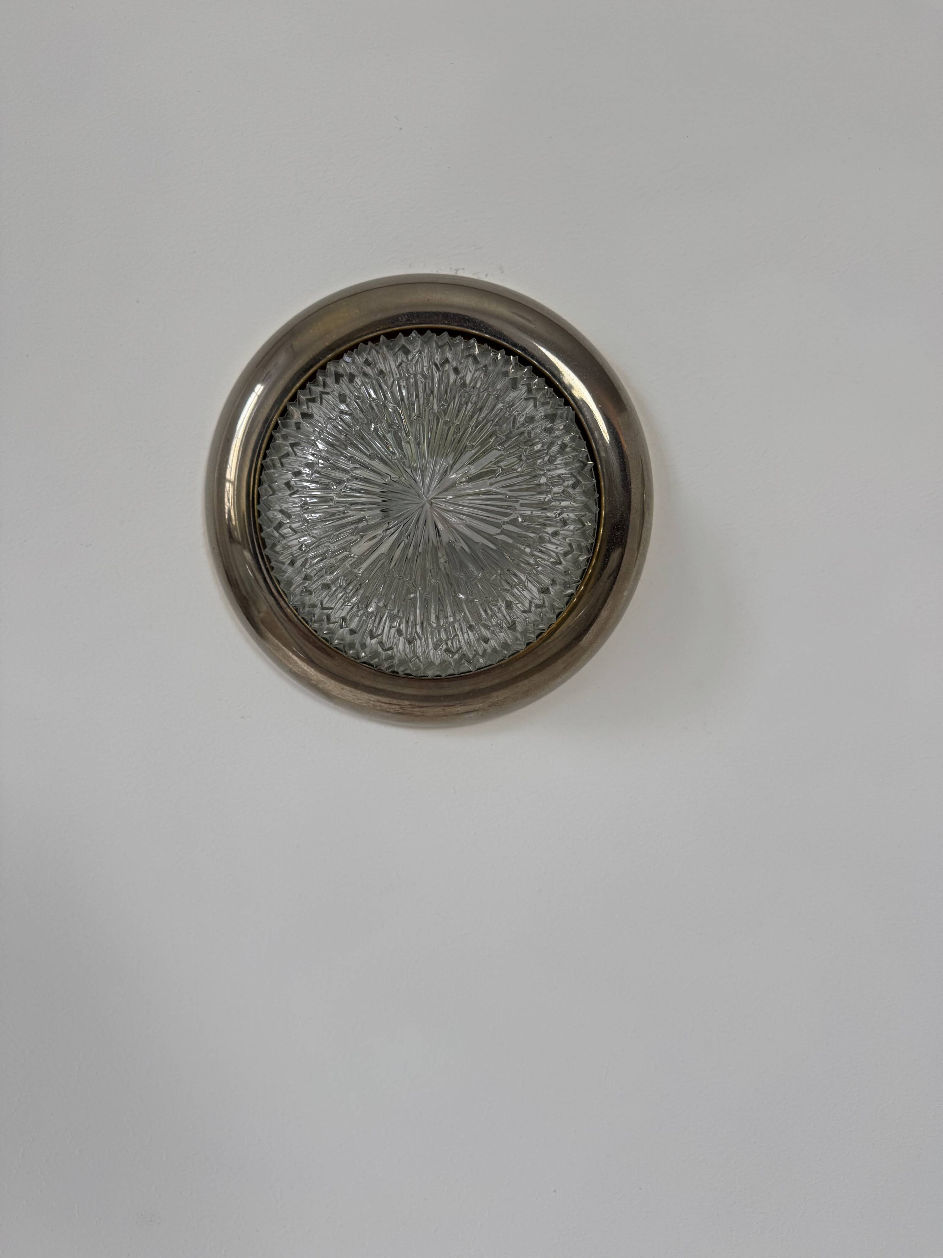 Pair of vintage wall lights, brass and pressed moulded glass, France, 1960.