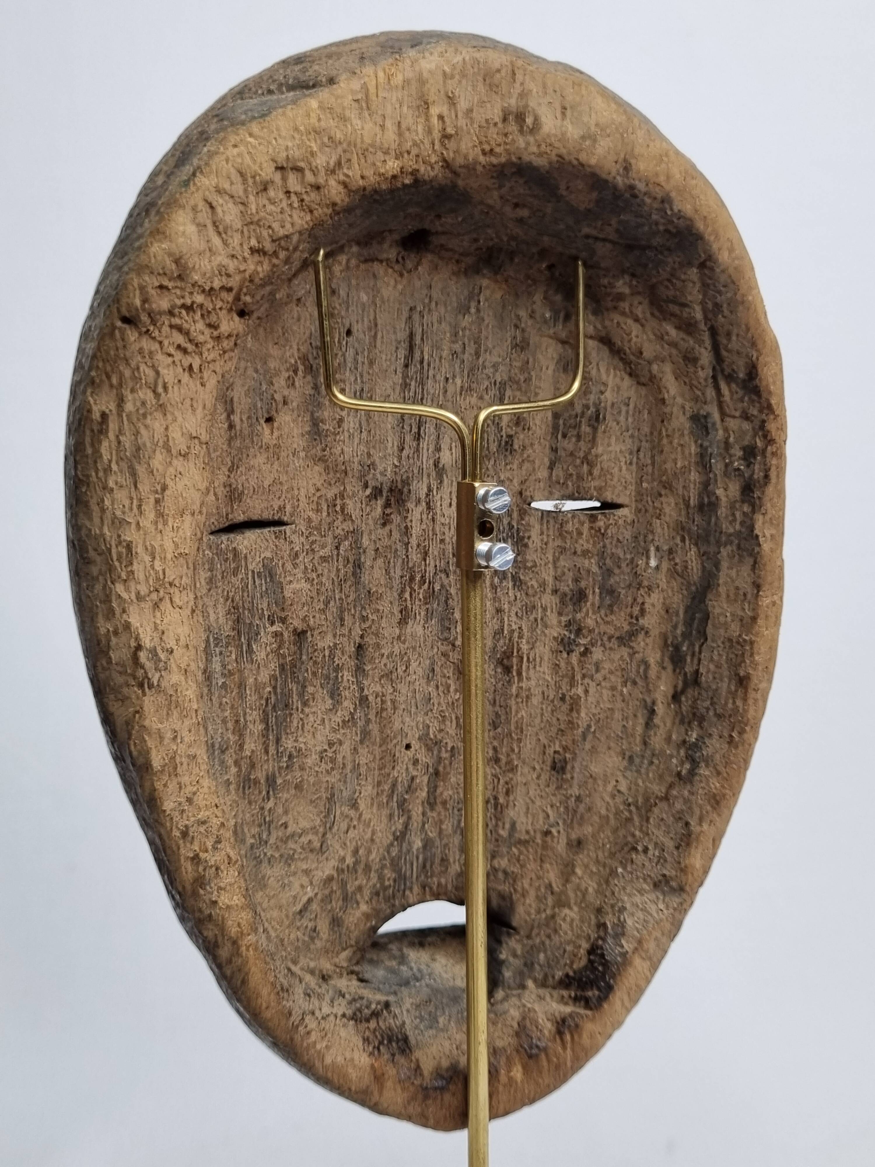 Antique Dan passport mask in carved wood 15 cm, with stand