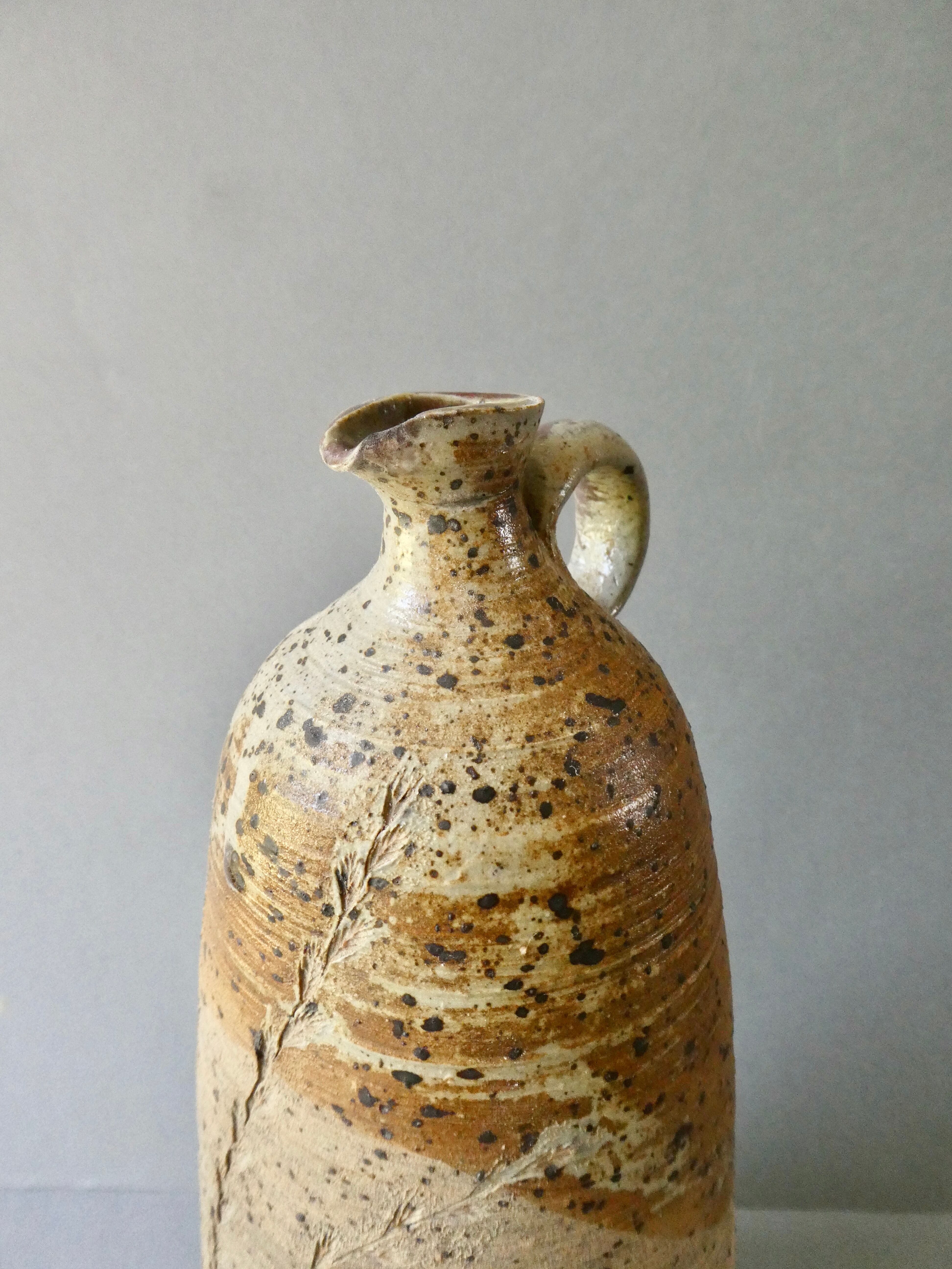 Stoneware bottle vase decorated with herbarium by Carole Boissière