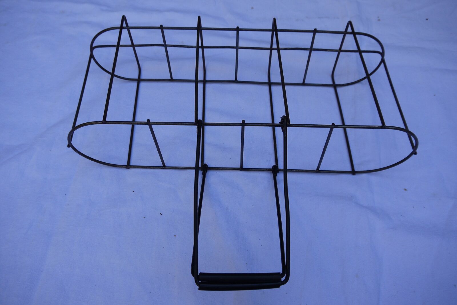 Old wire basket for 4 bottles