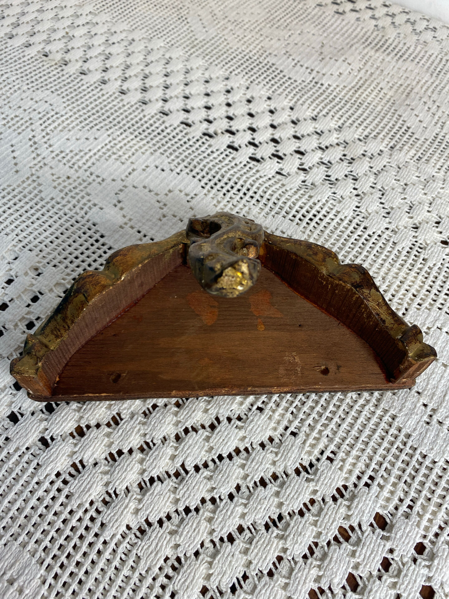 Small baroque-style console in gilded wood.