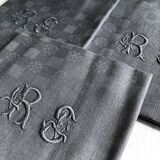 Suite of four napkins tinted in smoke grey
