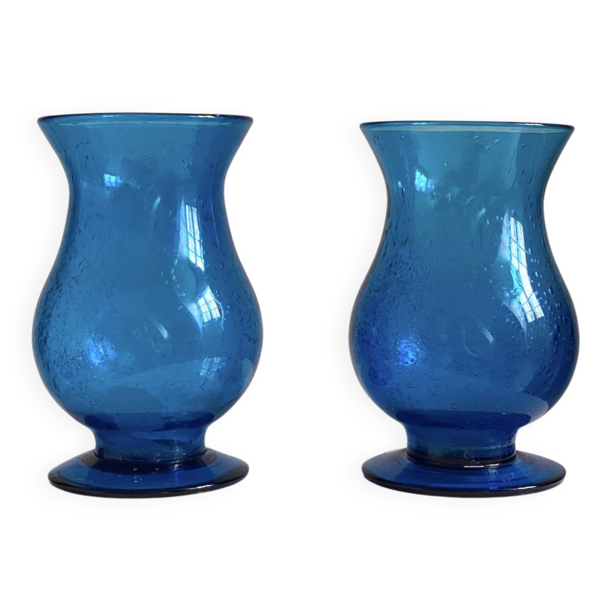 Pair of candle holders from the Biot glassworks, height 22 cm, diameter 15 cm.