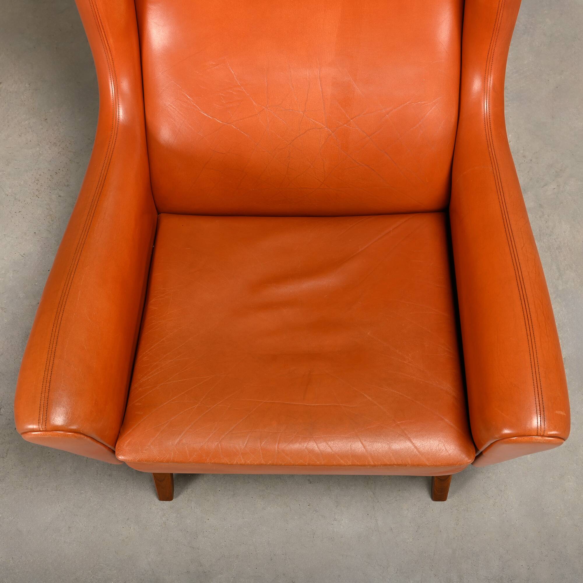 Illum Wikkelsø Wingback Armchair Model 110 in Cognac Leather, Denmark 1960s