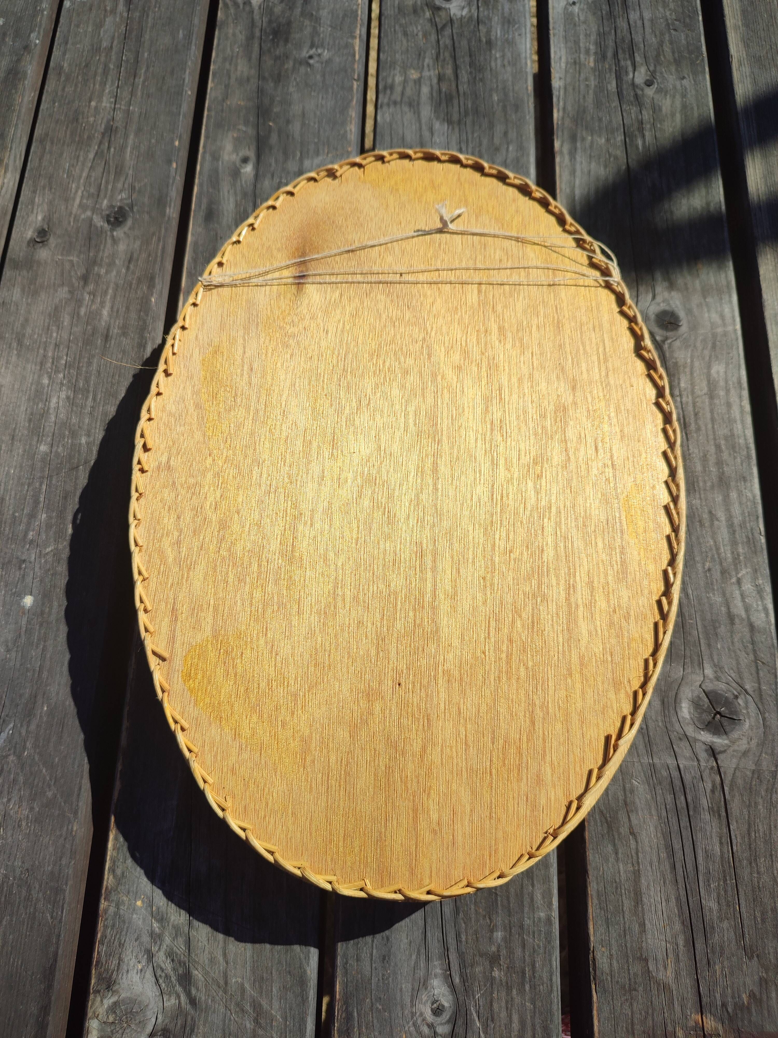 Vintage wall-mounted wicker and pyrographed wood bread basket