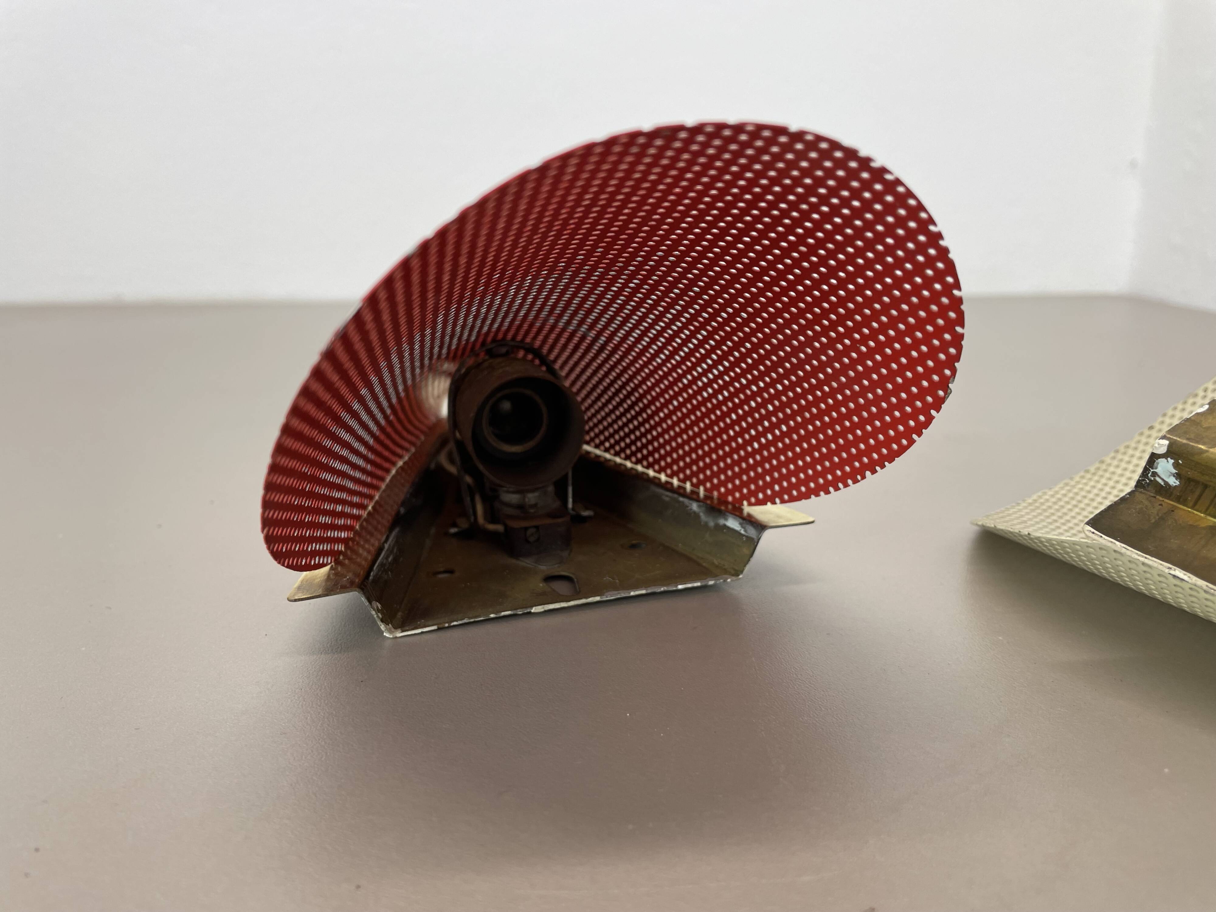 Set of two hole pattern theatre wall light sconces, france, 1950