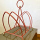Vintage orange metal magazine rack, 1970s