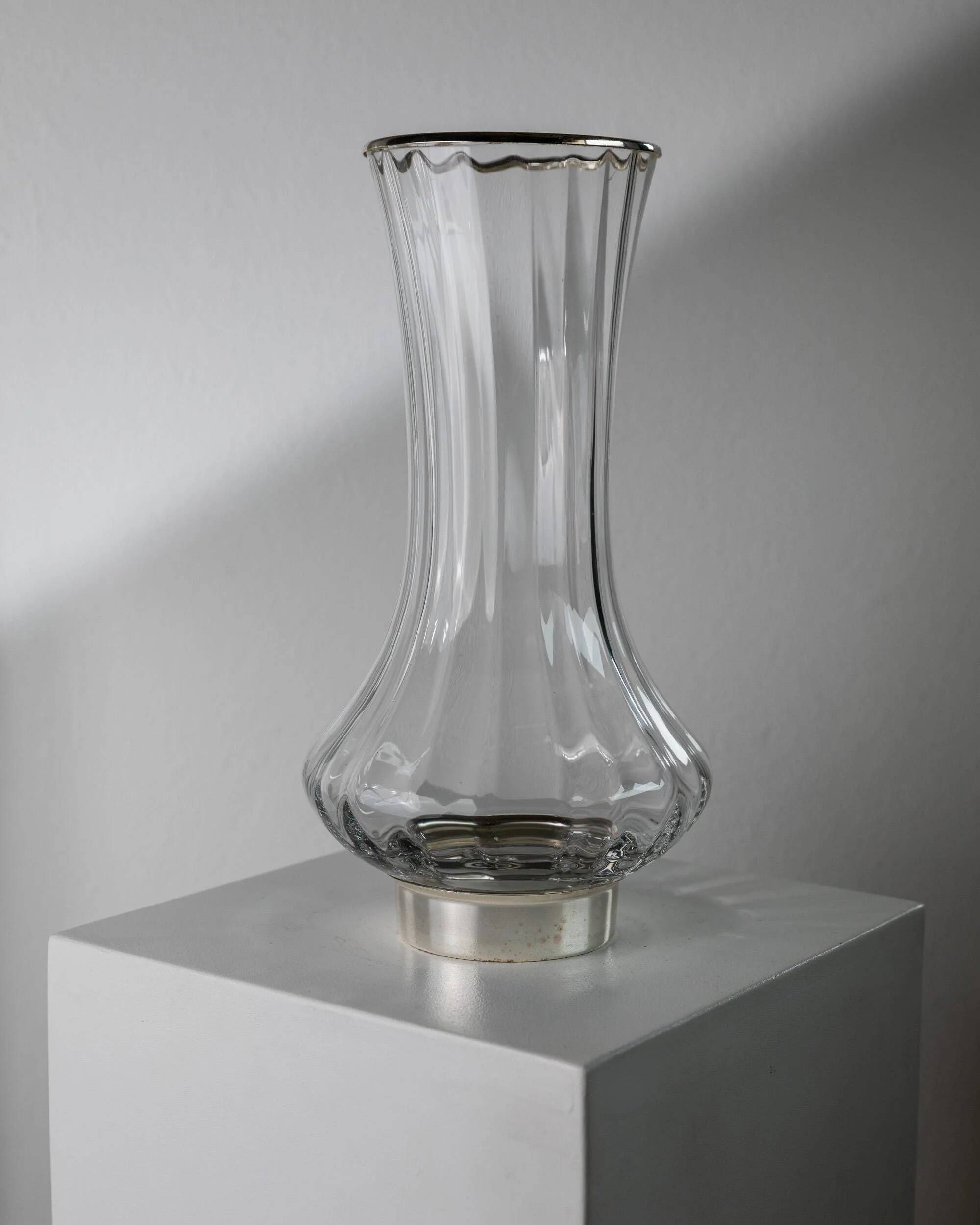 Vintage glass vase from the 1980s, transparent glass with fine linear pattern and silver metal details, elegant sculptural flower vase, gift idea.