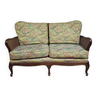 Antique English two-seater canapé, carved wooden frame.