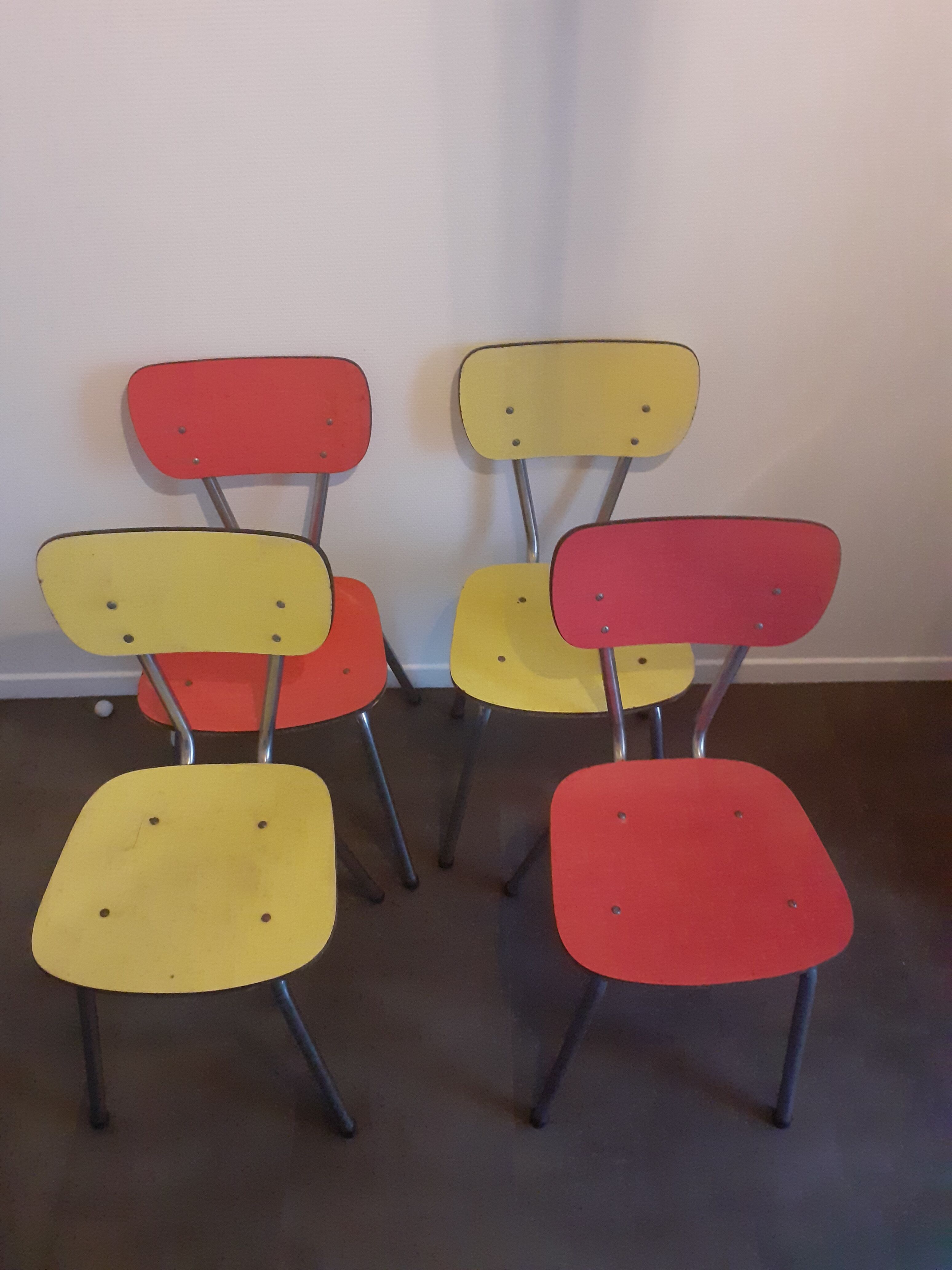 Set of 4 yellow and red formica chairs