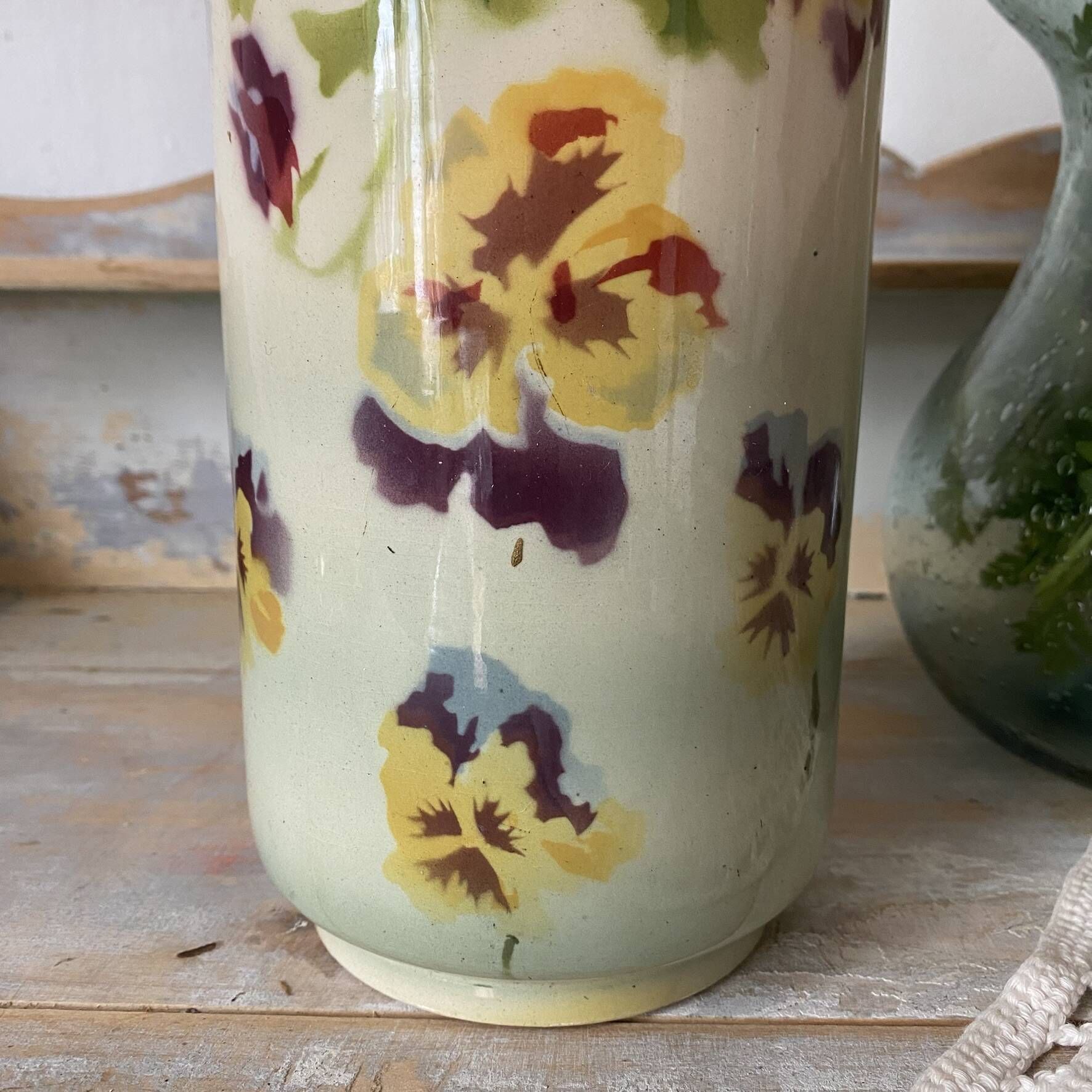 Large tubular vase in Choisy-le-Roi earthenware, decorated with pansies.