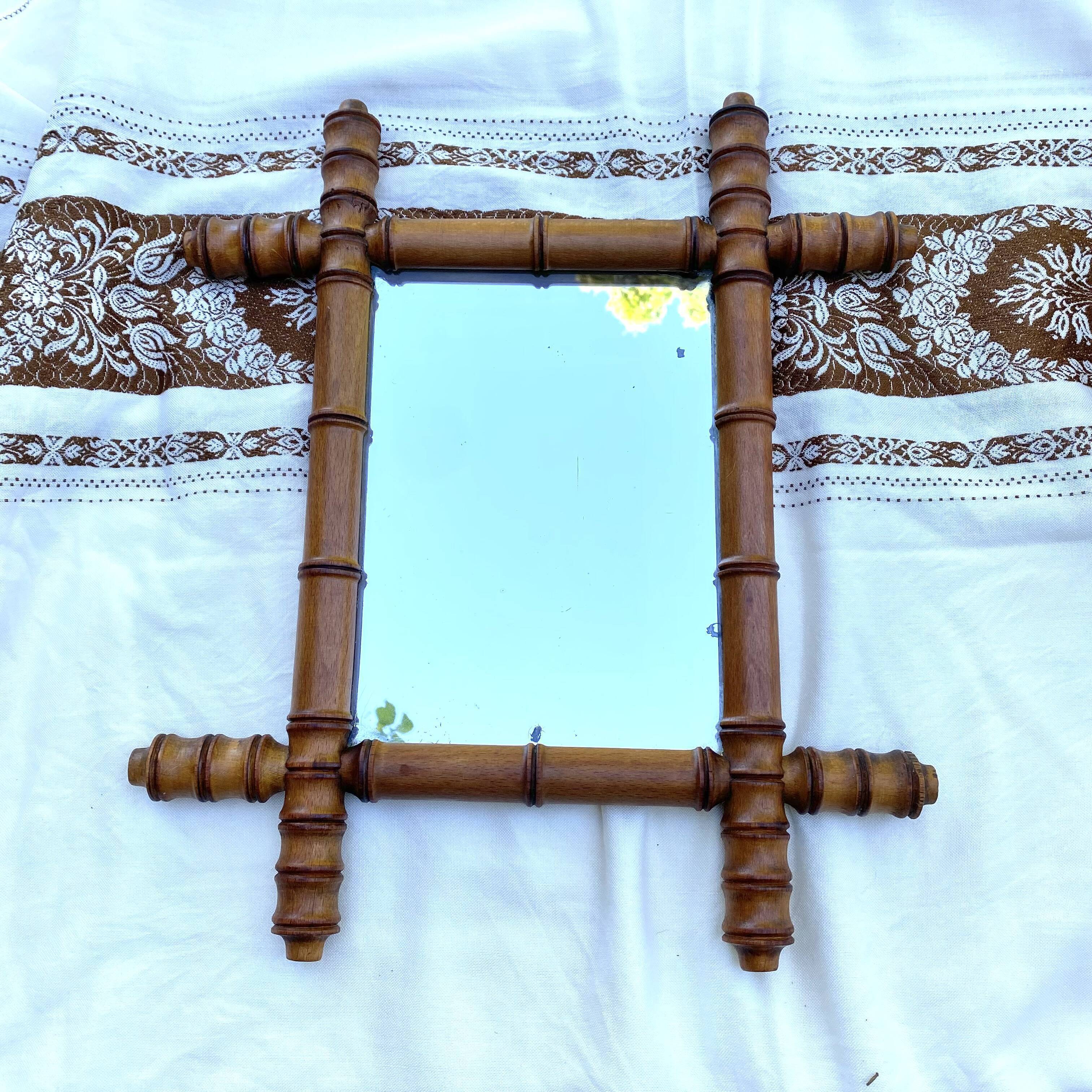 Antique mercury mirror in bamboo-style wood