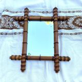 Antique mercury mirror in bamboo-style wood