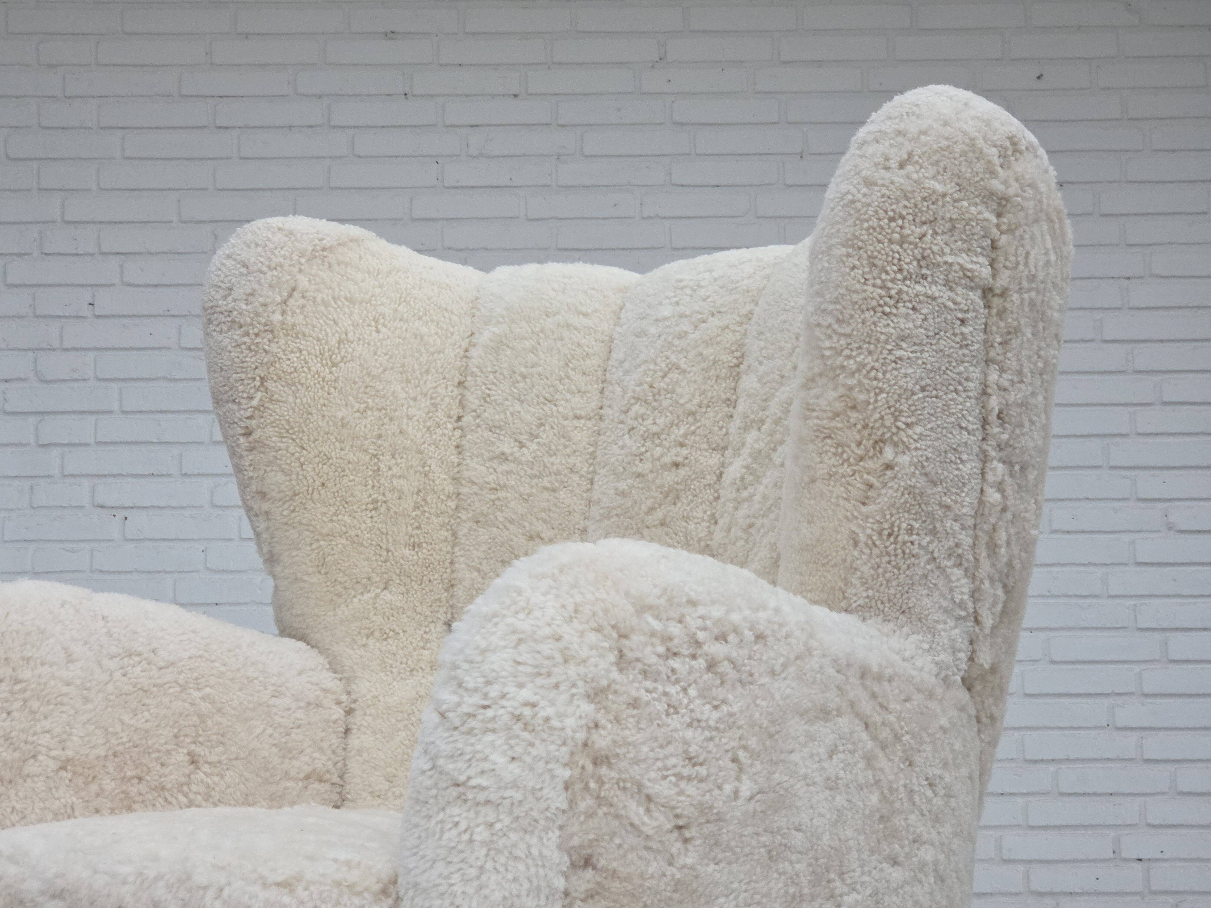 1960s, Danish design, reupholstered highback armchair, genuine sheepskin.