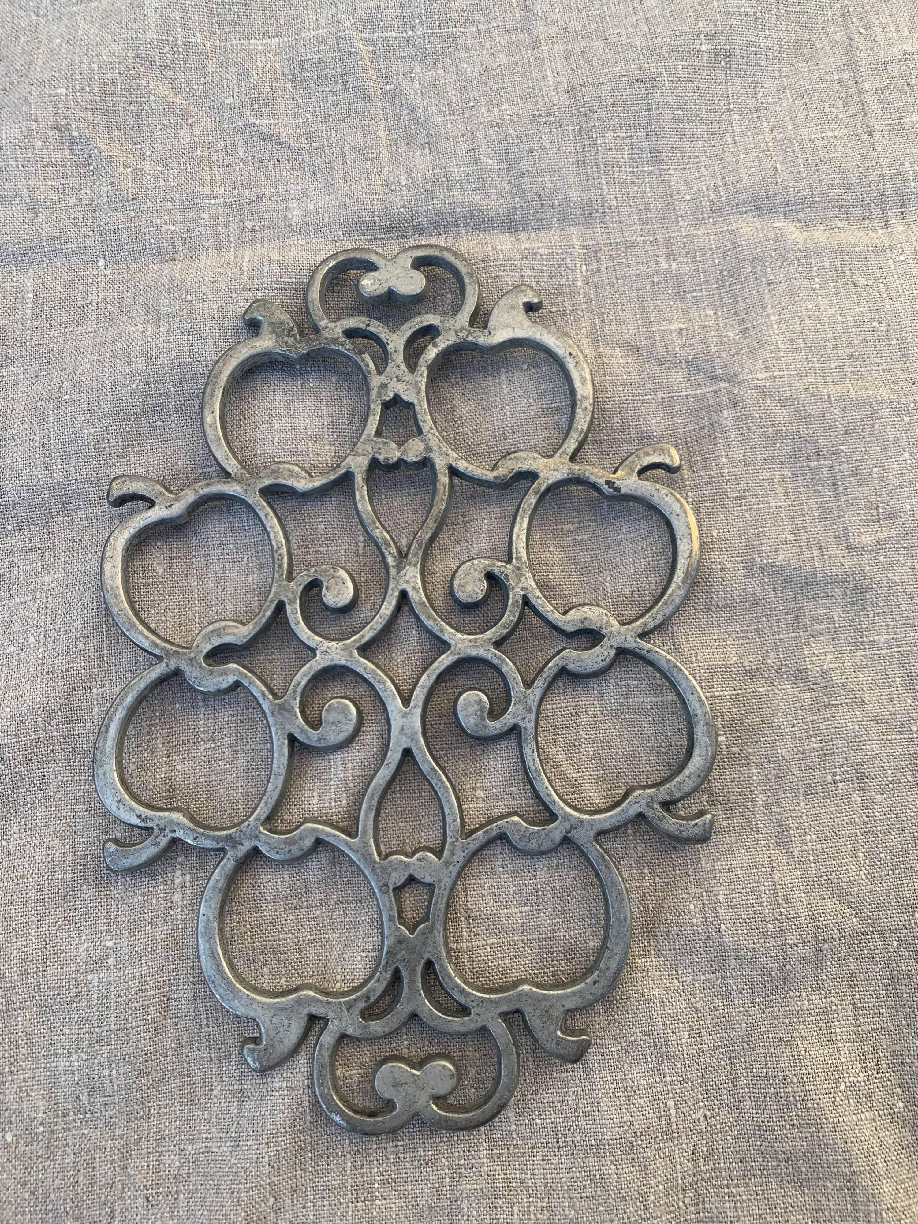 Pewter trivet, vintage apples model