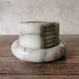 Ashtray and marble under glass