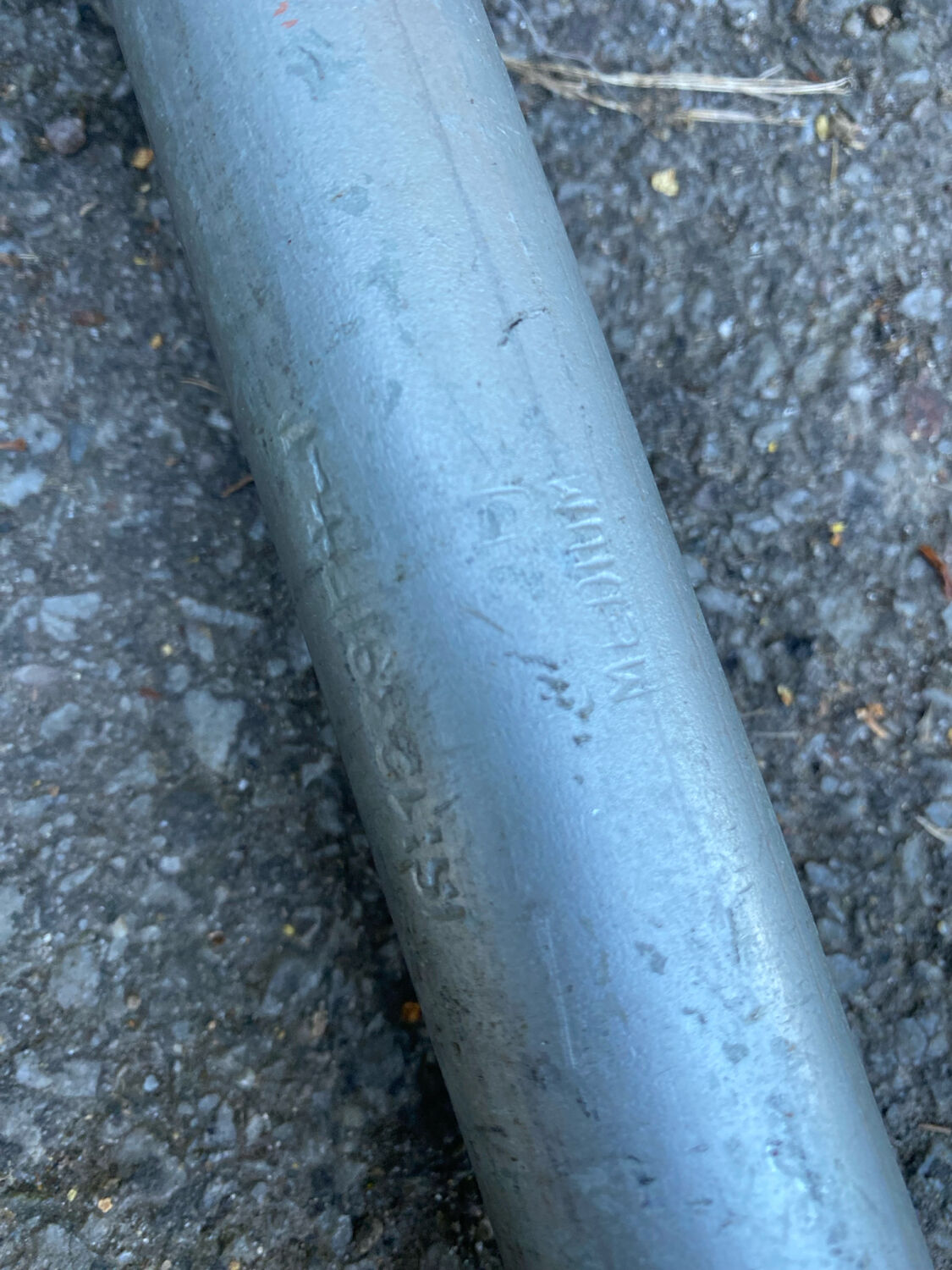 Vintage Italian industrial bench in leather and metal.