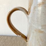 Stoneware pitcher with floral decoration