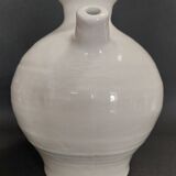 White ceramic goat-shaped creamer, first half of the 20th century.