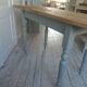 Vintage farm table, base and belt re-enchanted in verdigris, wooden top.