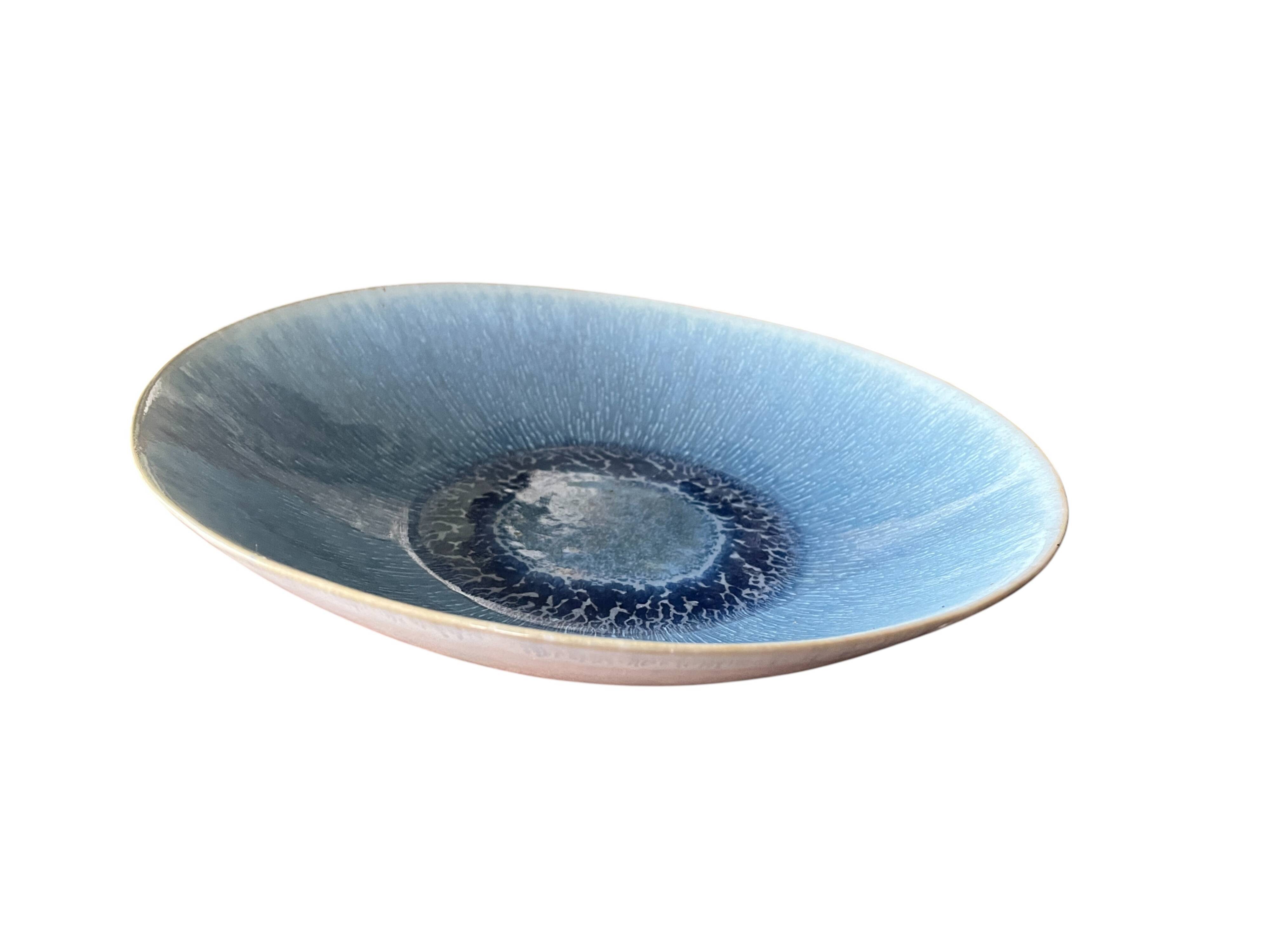 Large blue artisanal ceramic shallow dish from the 20th century.